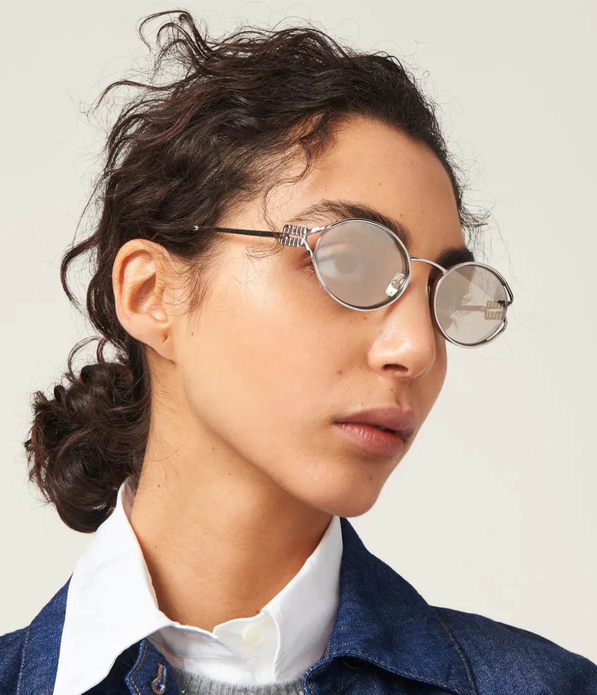 Miu Miu Oval Sunglasses In Silver