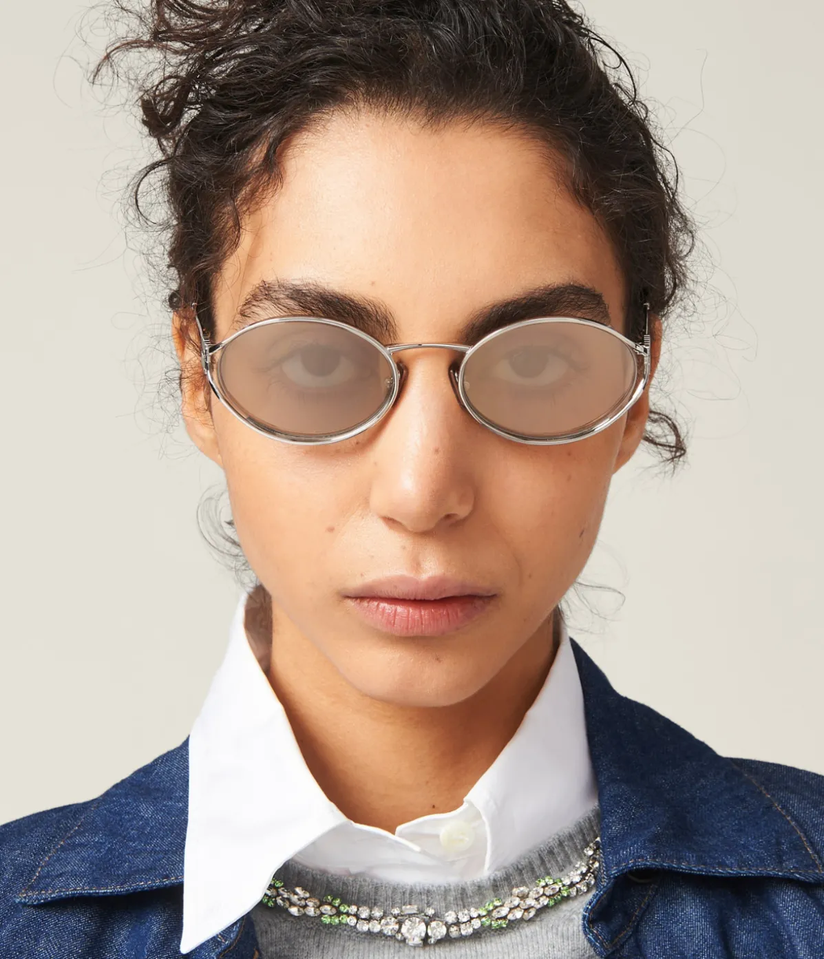 Miu Miu Oval Sunglasses In Silver